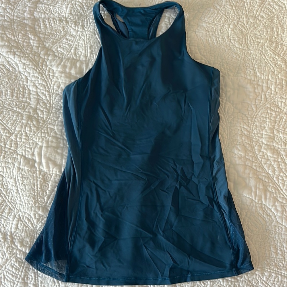2 Lulu lemon racer back tank tops, fit like a small/medium. Lightly worn